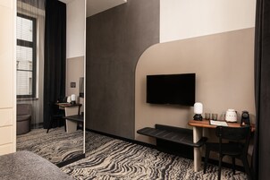 Premium bedding, memory-foam beds, minibar, in-room safe