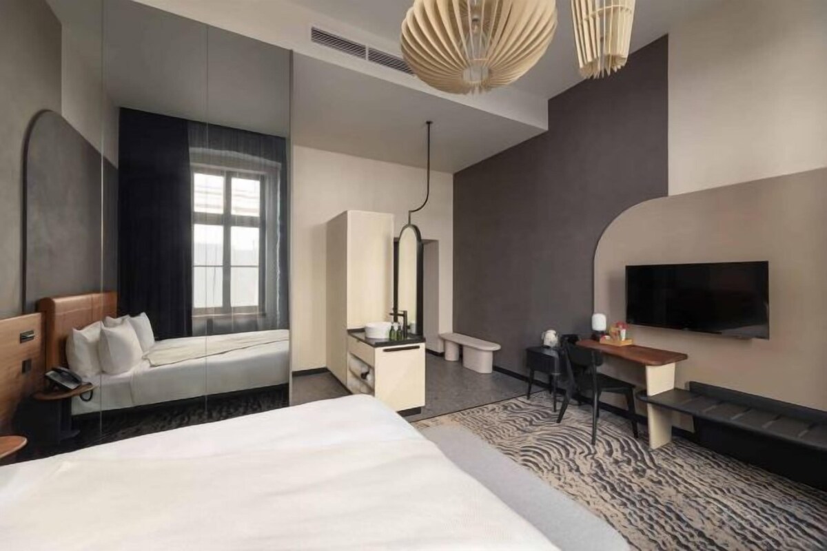 Premium bedding, memory foam beds, minibar, in-room safe