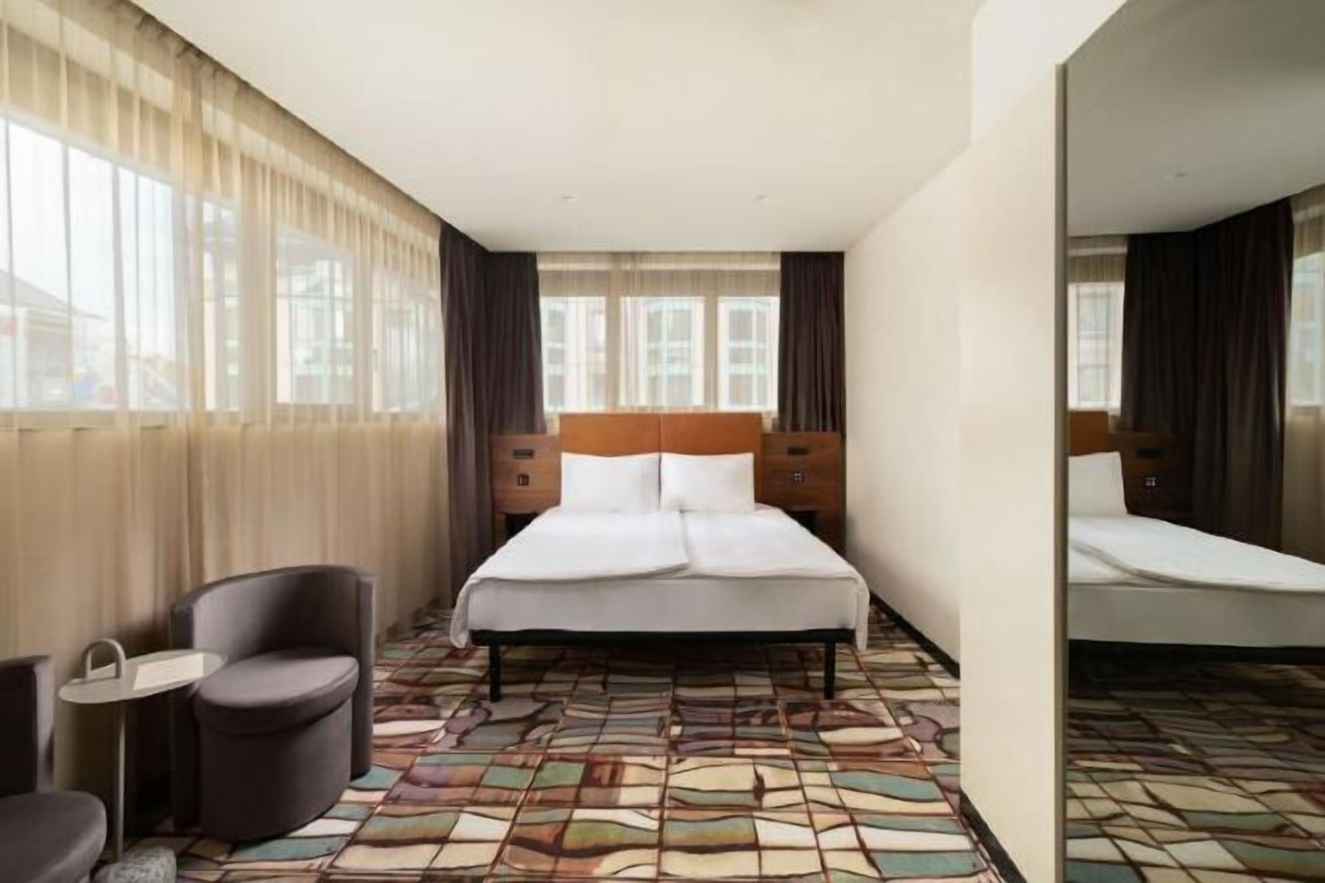 Premium bedding, memory foam beds, minibar, in-room safe