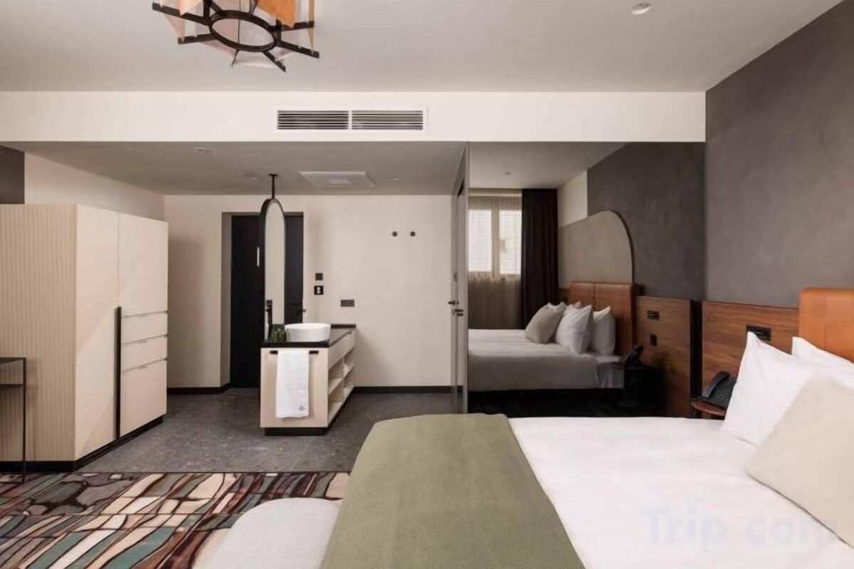 Premium bedding, memory foam beds, minibar, in-room safe