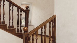 A wooden staircase with a potted plant at the bottom. - Olive Hotel (Yerevan)