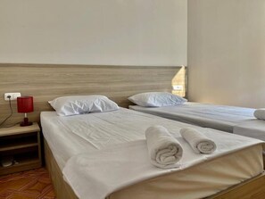 Doppel- oder Zweibettzimmer