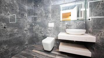 Shower, free toiletries, hair dryer, towels
