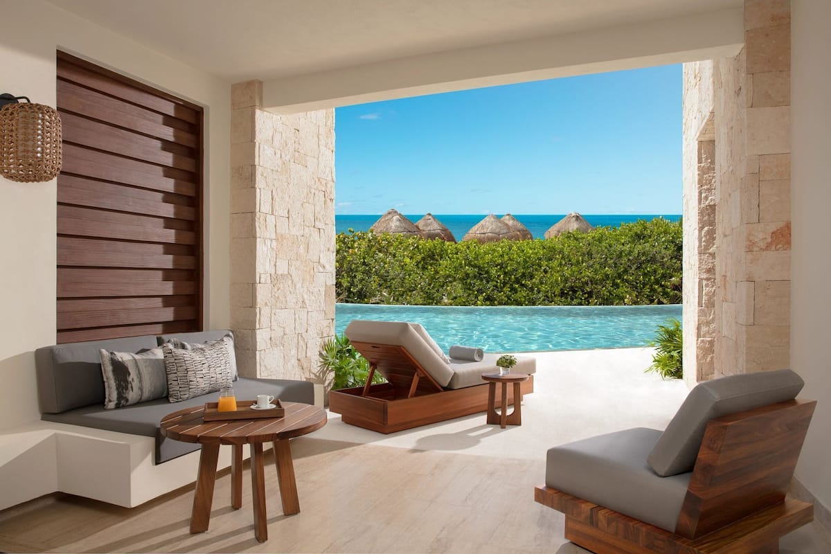 Preferred Club Junior Suite Swim Out Ocean Front | 1 chambre, literie hypoallergénique, articles de minibar gratuits