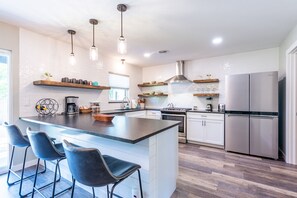 House, 3 Bedrooms | Private kitchen | Fridge, oven, coffee/tea maker - Zander Haus 3 Bedroom Home by RedAwning (Fredericksburg)