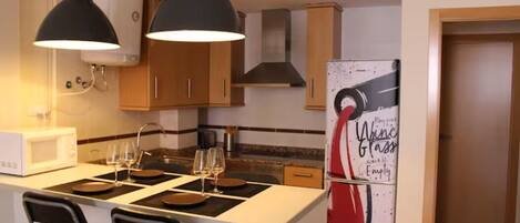 Fridge, microwave, coffee/tea maker, toaster