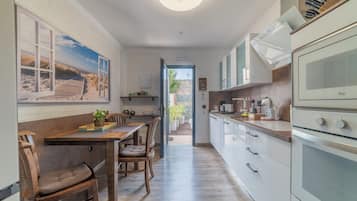 Superior Suite | Private kitchen | Full-sized fridge, microwave, oven, stovetop