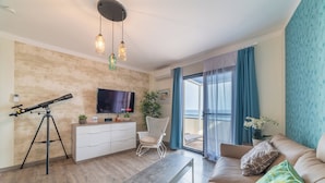 Suite Superior | Area keluarga | TV