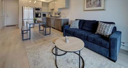 Central Condo with AC and Private Balcony