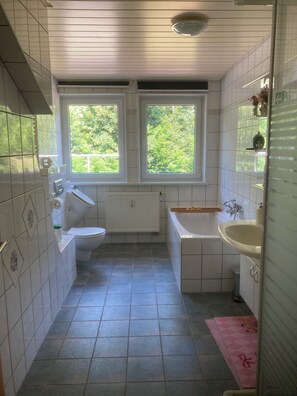Hair dryer, towels, soap, shampoo