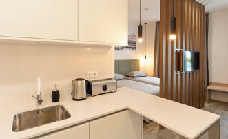 Comfort Apartment | Private kitchen | Fridge, microwave, oven, stovetop