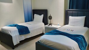 3 habitaciones, tabla de planchar con plancha, wifi y ropa de cama 