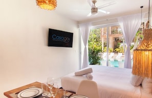 Deluxe Studio, Pool View | In-room safe, free WiFi, bed sheets