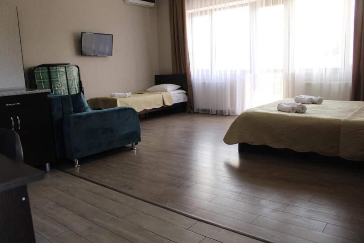 Quadruple Room, Balcony, City View | Desk, laptop workspace, soundproofing, free WiFi