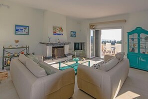 Smart TV, fireplace, table tennis, books