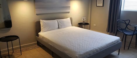 Habitació executiva, 1 llit de matrimoni, bany compartit | 1 dormitori, cortines opaques, wifi gratuïta i roba de llit