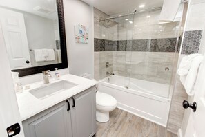 Hair dryer, towels, soap, shampoo