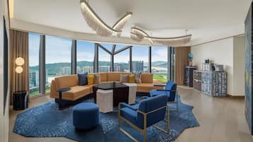 Wow Suite | Living room | 65-inch LCD TV with cable channels