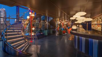 4 bars/lounges, poolside bar