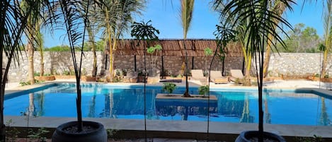 Deluxe Studio Suite, Multiple Beds, Pool View | 1 bedroom, premium bedding, individually decorated