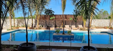 Deluxe Studio Suite, Multiple Beds, Pool View | Premium bedding, individually decorated, individually furnished