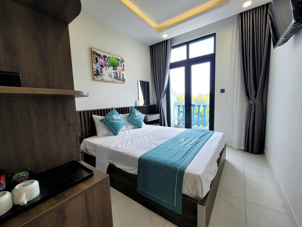 Habitación estándar | Ropa de cama de alta calidad y minibar