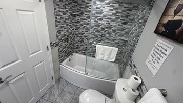 Shower, towels, soap, shampoo