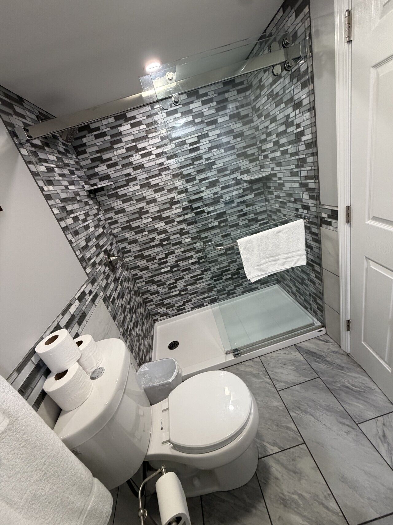 Shower, towels, soap, shampoo