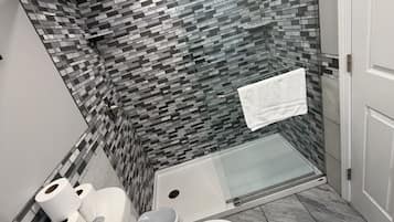 Shower, towels, soap, shampoo
