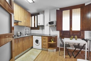 Fridge, microwave, coffee/tea maker, toaster