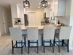 Cookware/dishes/utensils, dining tables, kitchen islands