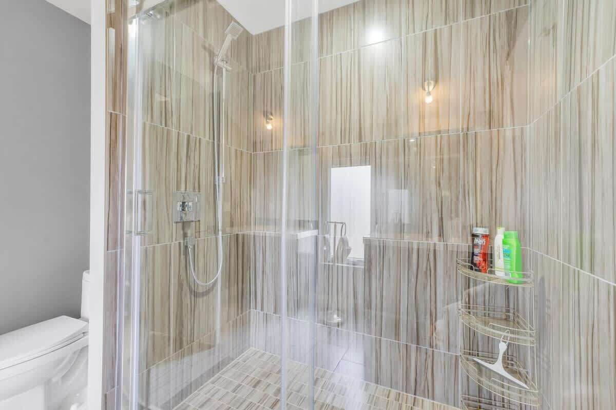Bathtub, hair dryer, towels