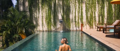 Outdoor pool, pool umbrellas, sun loungers