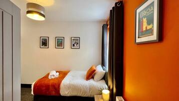 Desk, iron/ironing board, travel cot, free WiFi