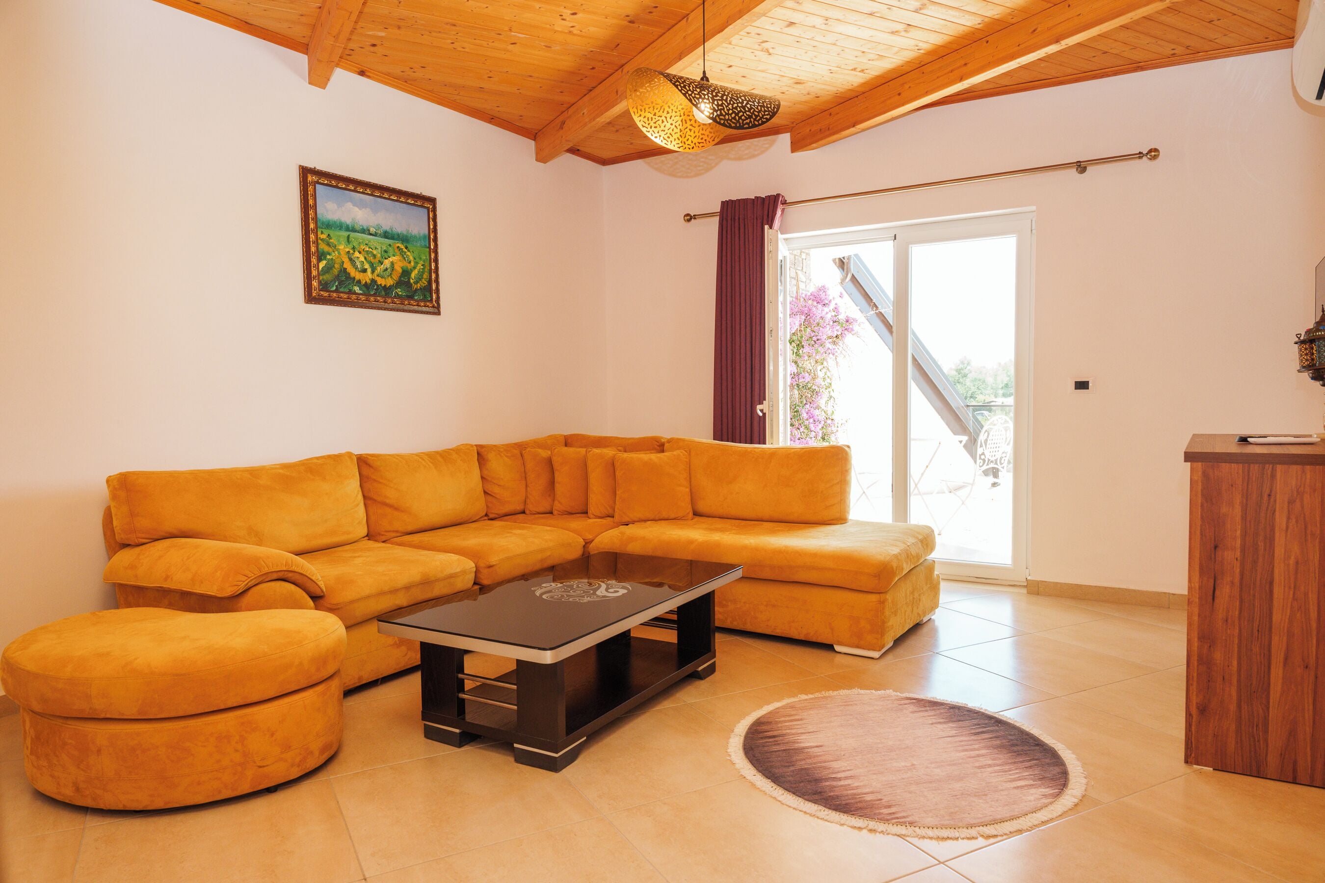 Family Studio, Balcony | Living area | 81-cm Smart TV with cable channels, heated floors