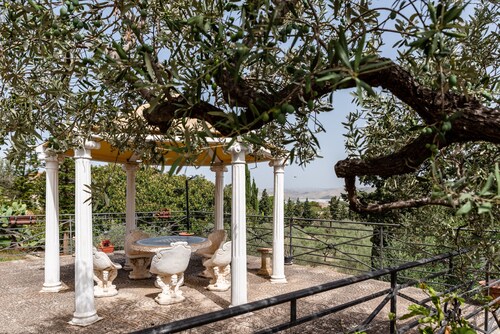 Appartement 'Casa Leonardo' avec terrasse partagée, jardin privé et climatisation 12 000 BTU