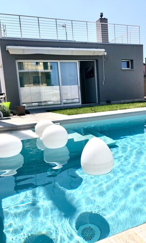 Holiday Home 'Chalet Al Mare' with Private Pool, Garden, and Air Conditioning