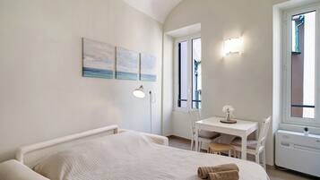 1 chambre, fer et planche Ă repasser, Wi-Fi gratuit, draps fournis