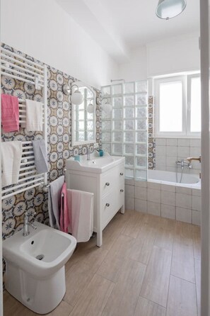 Hair dryer, towels, soap, toilet paper