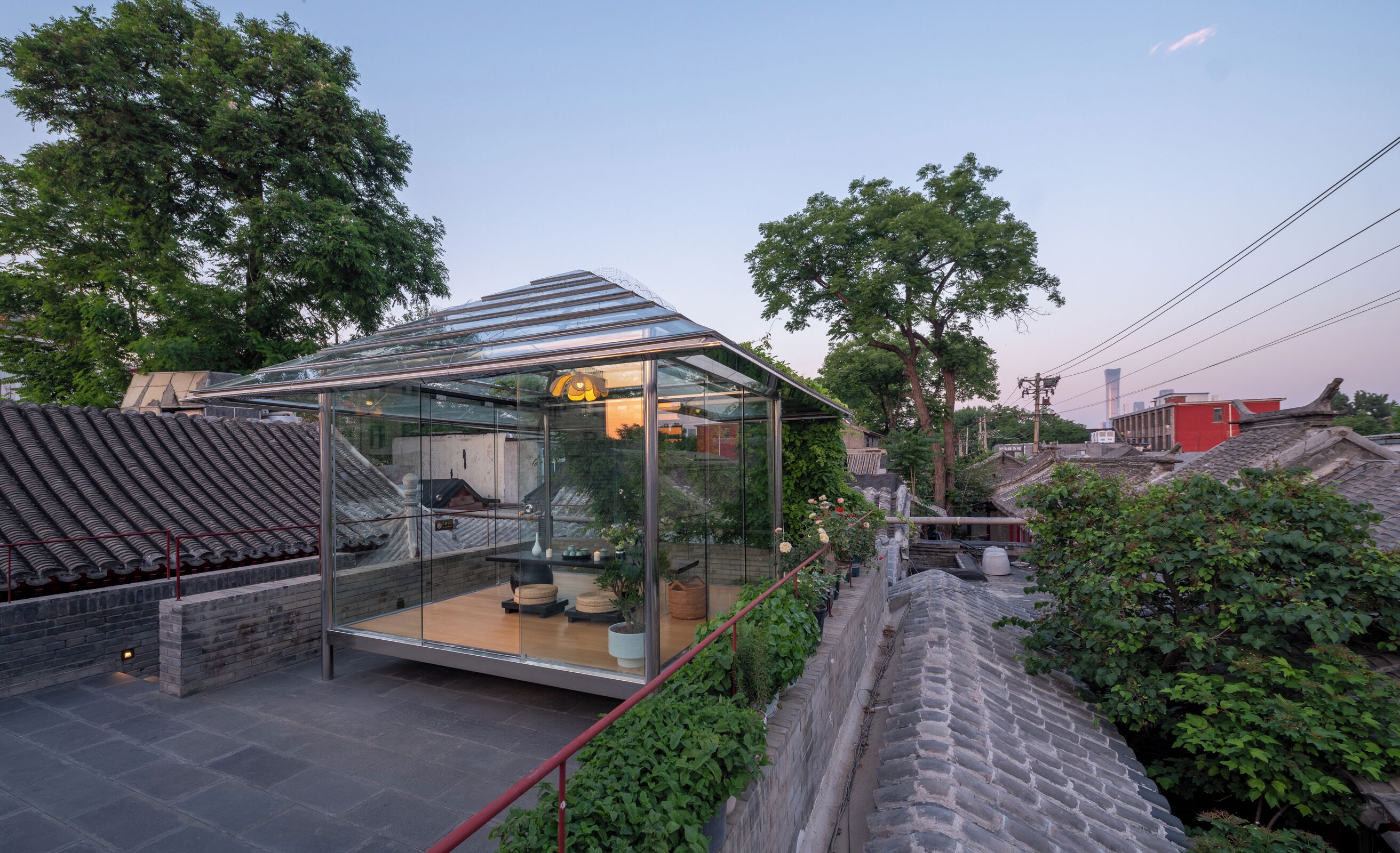 A traditional Korean house with a modern glass extension.