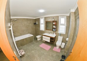 Shower, bidet, towels, soap