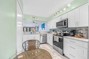 Fridge, microwave, oven, stovetop - Beachfront condo w/ pool & hot tub (Cocoa Beach)