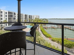Outdoor dining - Waterfront 1BR condo on Marco Island with pool, WiFi, and full kitchen. (Marco Island)