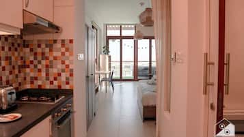 Apartamento (0 Bedroom) | Cozinha americana privada | Micro-ondas, fogão, cooktop, torradeira