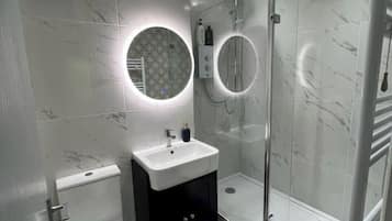 Hair dryer, towels, soap, shampoo