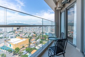 Habitación familiar, 2 habitaciones, vista al océano, frente al mar | Terraza o patio