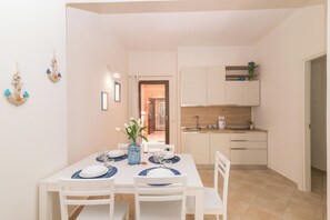 Apartament familiar, 2 dormitoris (Appartamento Mirto In The City Center) | Menjador