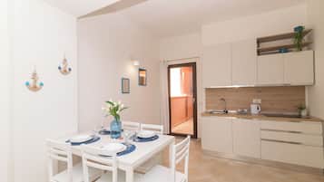 Appartement Familial, plusieurs chambres (Appartamento Mirto In The City Center) | Restauration