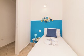 Family Apartment, Multiple Bedrooms (Appartamento Mirto In The City Center) | 2 bedrooms, free WiFi, bed sheets