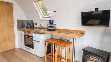 Fridge, electric kettle, cookware/dishes/utensils